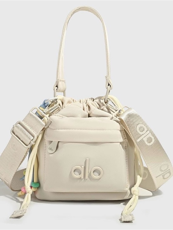 ALO Yoga Handbags - ALO Yoga Cream Drawstring Puffer Mini Crossbody
